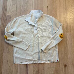 Kule cream knit long sleeve polo with smiley faces